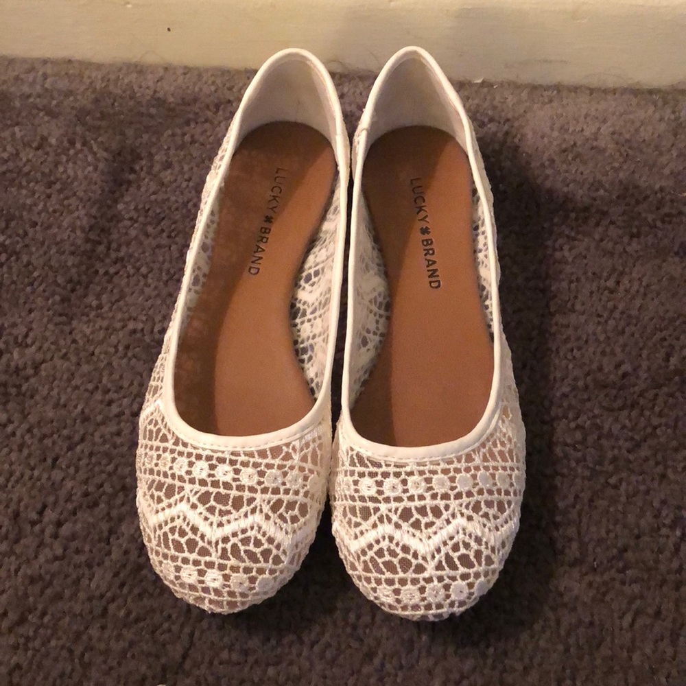 Lucky brand white lacy flat in a size 7.5